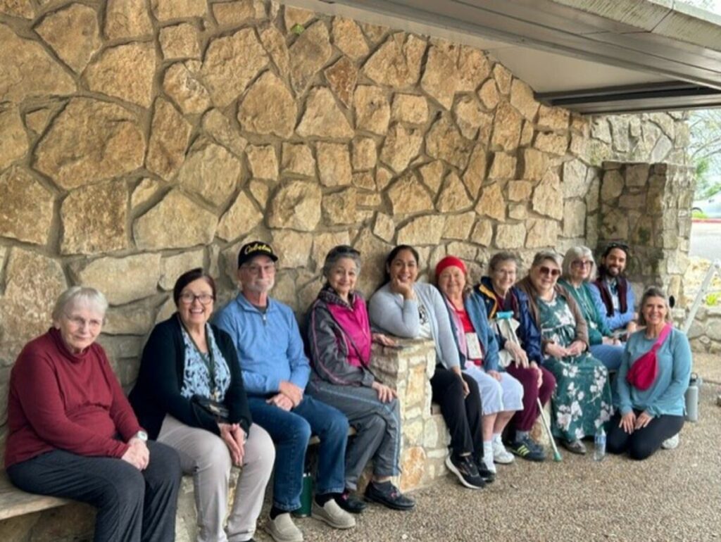 Buda Oaks | Group sitting outside