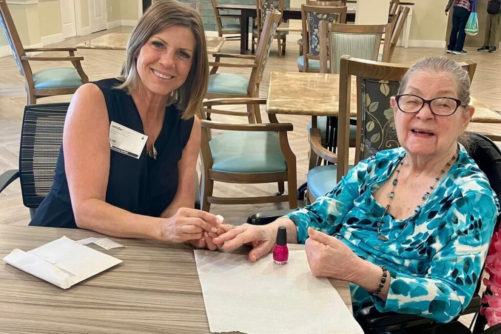 Buda Oaks | Resident Getting Nails Painted | Assisted Living VS Memory Care